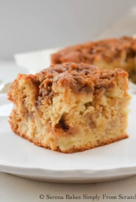 Delicious apple coffee cake topped with cinnamon brown sugar crumb.
