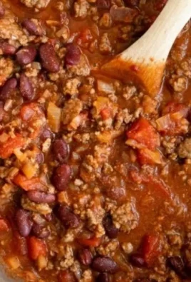 Delicious bowl of best chili recipe served with toppings