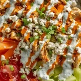 Buffalo Chicken Protein Bowl with fresh vegetables and grains