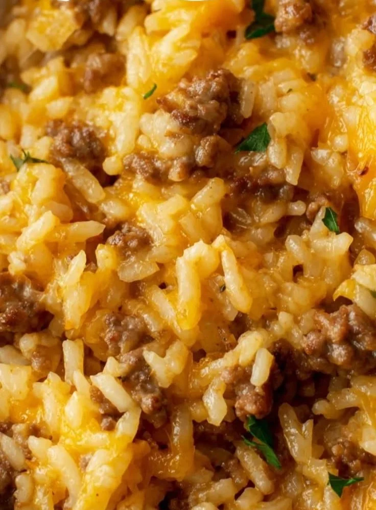 Cheesy ground beef and rice casserole in a baking dish