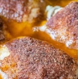 Crock Pot chicken thighs cooked to perfection with herbs and spices