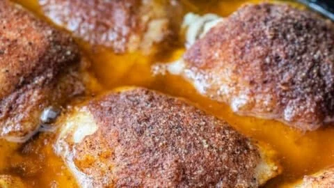 Crock Pot chicken thighs cooked to perfection with herbs and spices