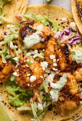 Grilled shrimp tacos served with cilantro lime slaw on a plate