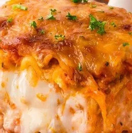 Delicious homemade lasagna with layers of pasta, cheese, and tomato sauce.