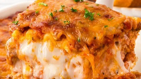 Delicious homemade lasagna with layers of pasta, cheese, and tomato sauce.