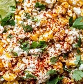 Delicious Mexican Street Corn topped with cheese and spices