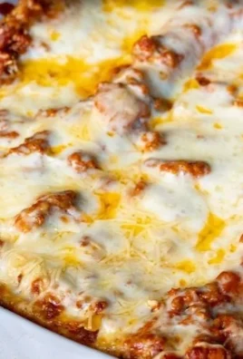 Delicious No-Boil Lasagna layered with cheese and sauce.