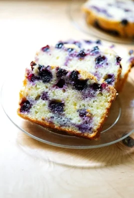 One-bowl lemon-blueberry quick bread freshly baked and sliced