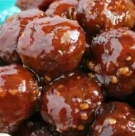 Slow Cooker Honey Garlic Meatballs simmering in sauce