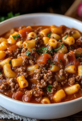 Bowl of Southern style goulash with pasta, meat, and vegetables