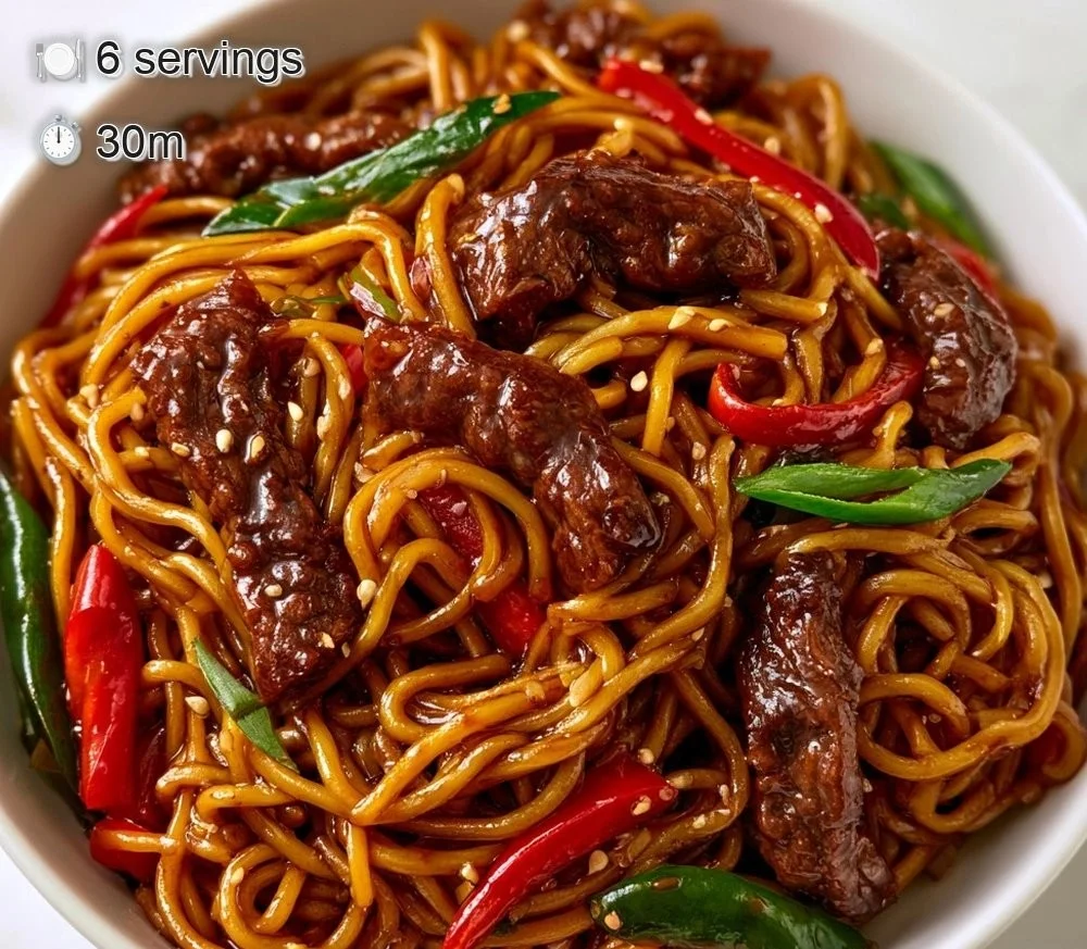 Delicious bowl of beef lo mein with tender noodles and glossy sauce