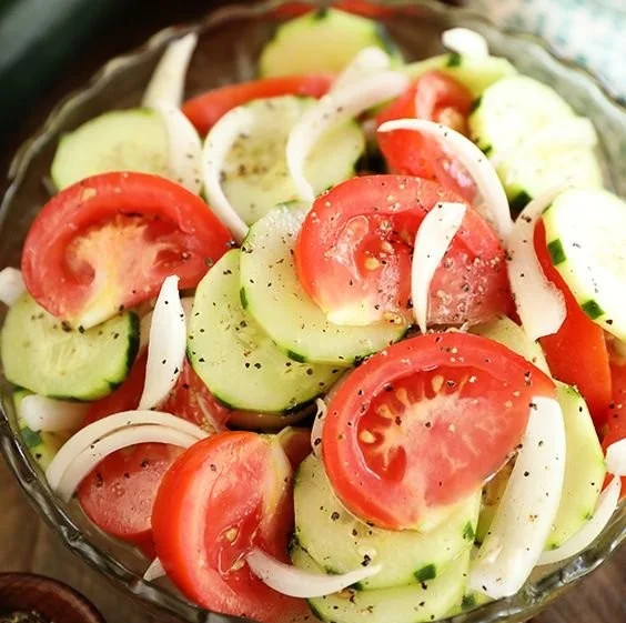 Fresh Tomato, Cucumber, and Onion Salad served in a bowl
